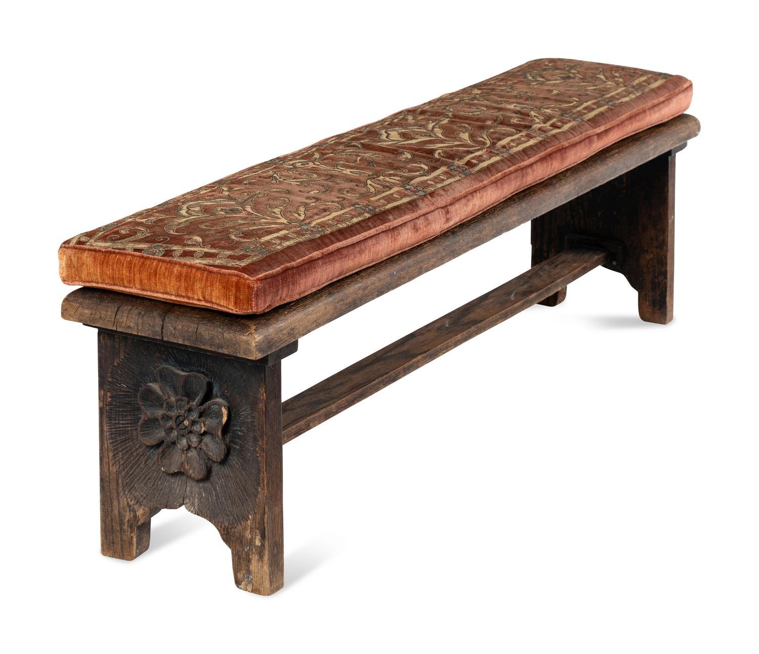 An Arts and Crafts Carved Oak Hall Bench