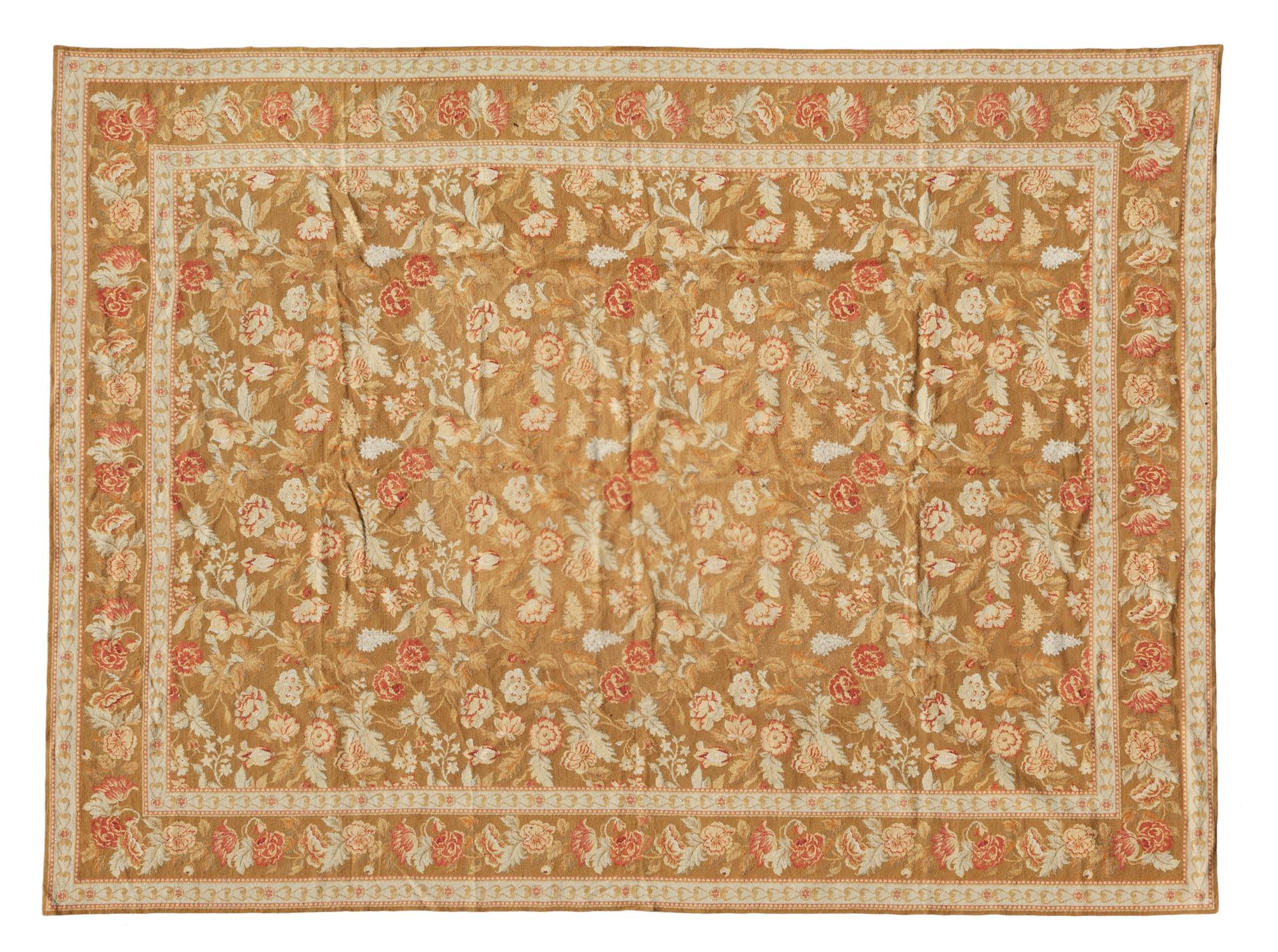 A Needlepoint Rug 11 feet 10 inches x 9 feet. — 20TH CENTURY