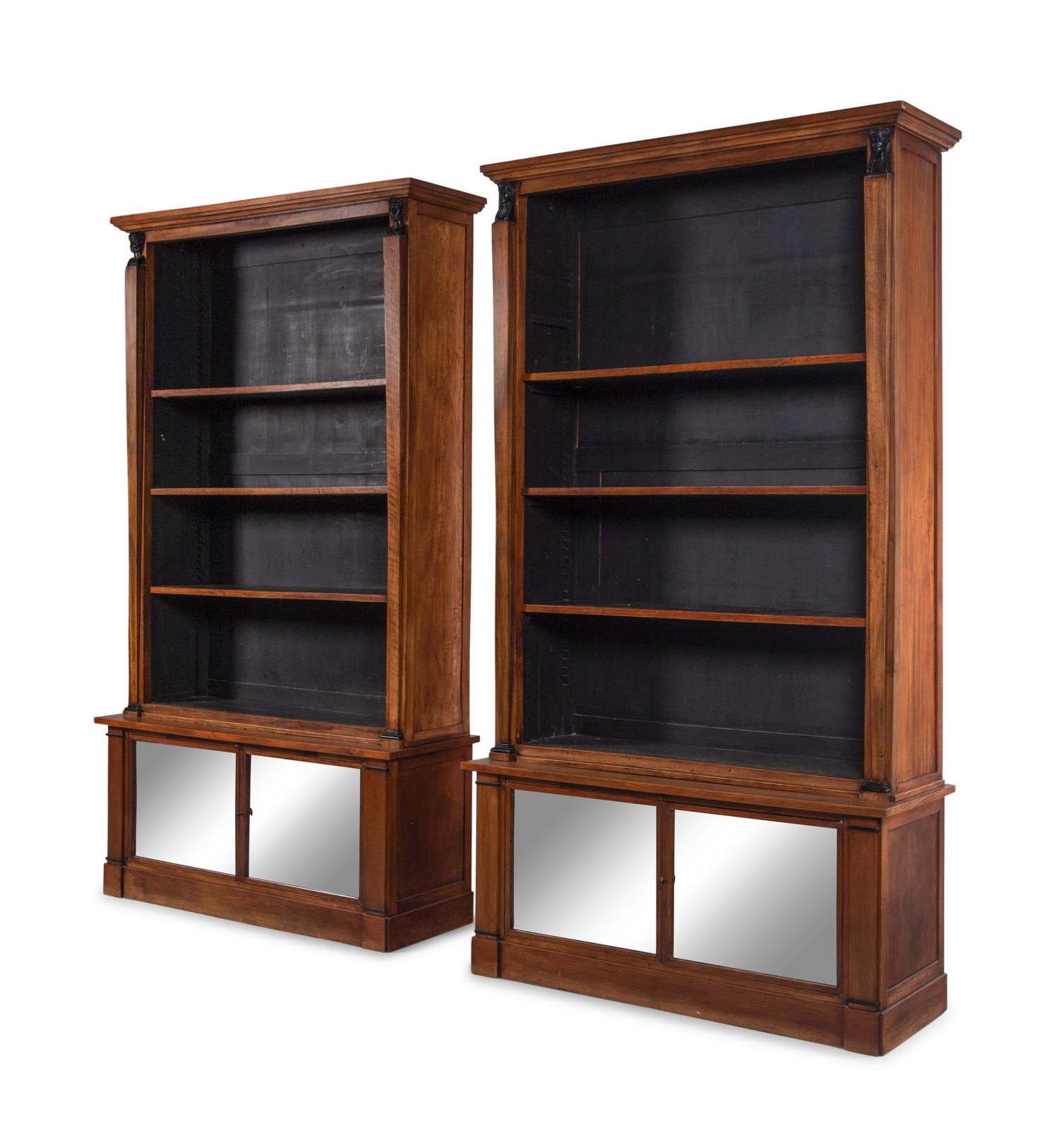 A Pair of Italian Parcel Ebonized Walnut Bookcases