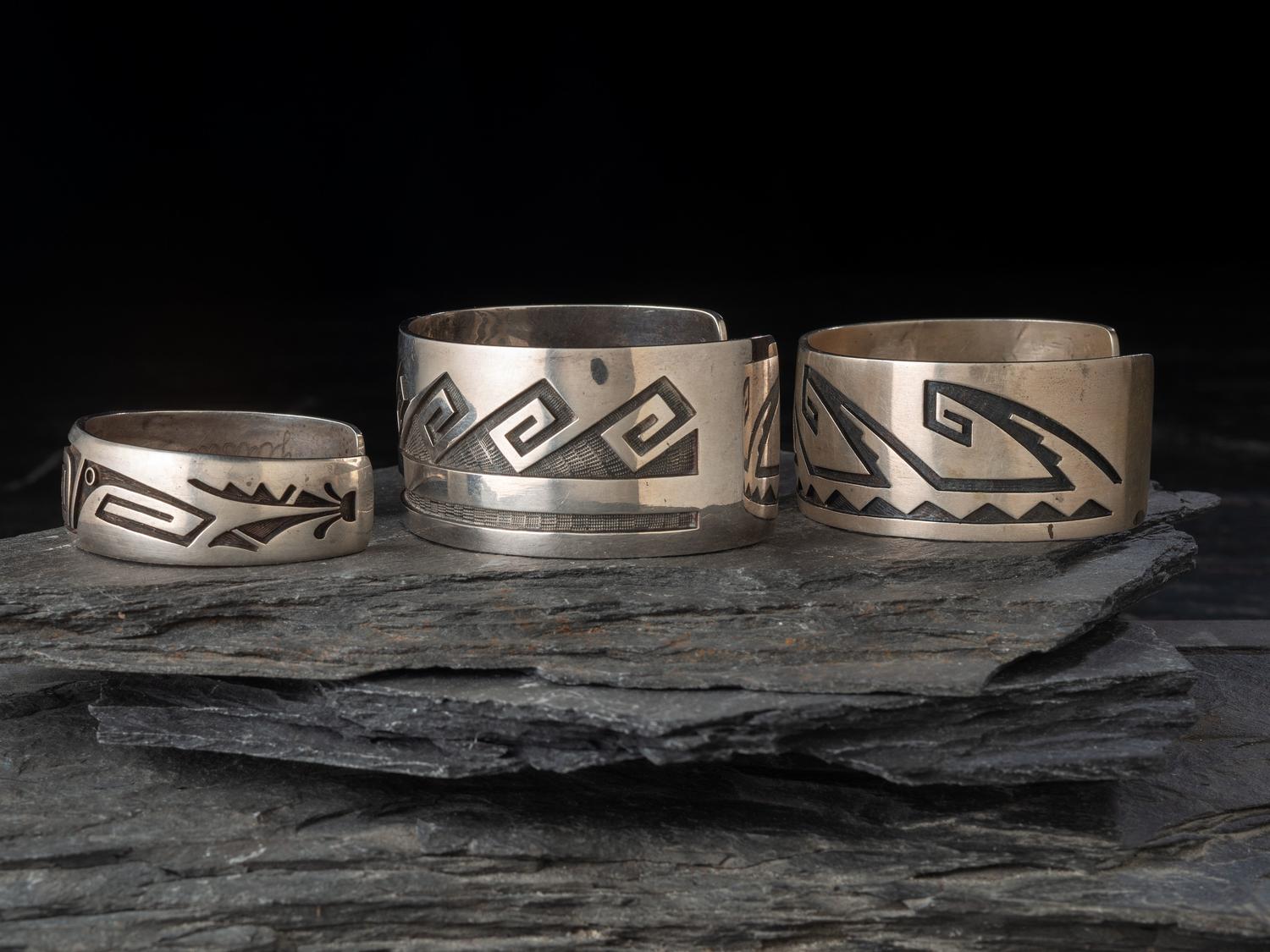 Group of Hopi Silver Overlay Cuff Bracelets