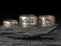Group of Hopi Silver Overlay Cuff Bracelets