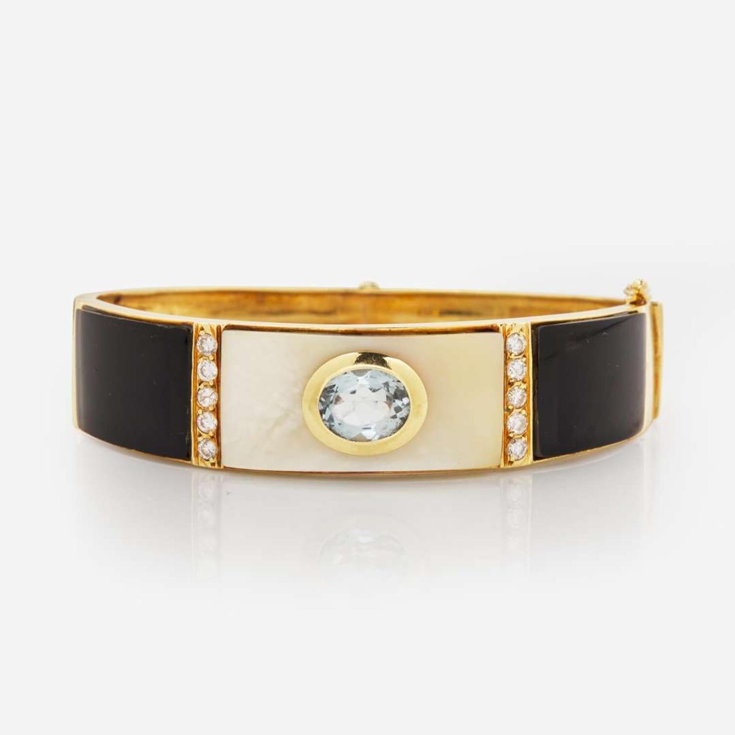 A 14K Yellow Gold and Gemstone Bangle Bracelet