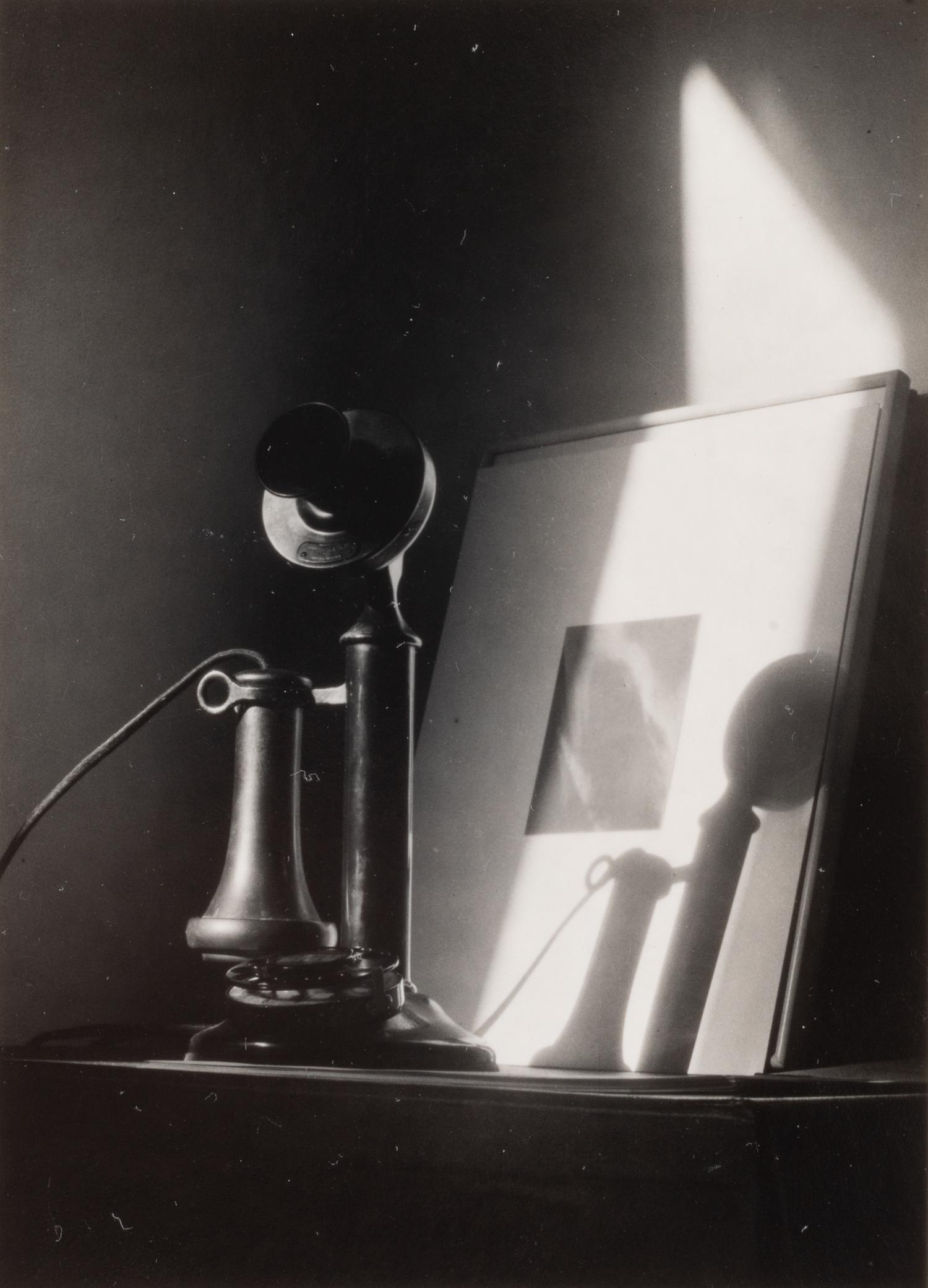 Telephone, in front of Alfred Stieglitz "Equivalent," at An American Place, New York , ca. 1940; printed later