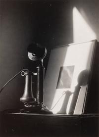 Telephone, in front of Alfred Stieglitz "Equivalent," at An American Place, New York , ca. 1940; printed later