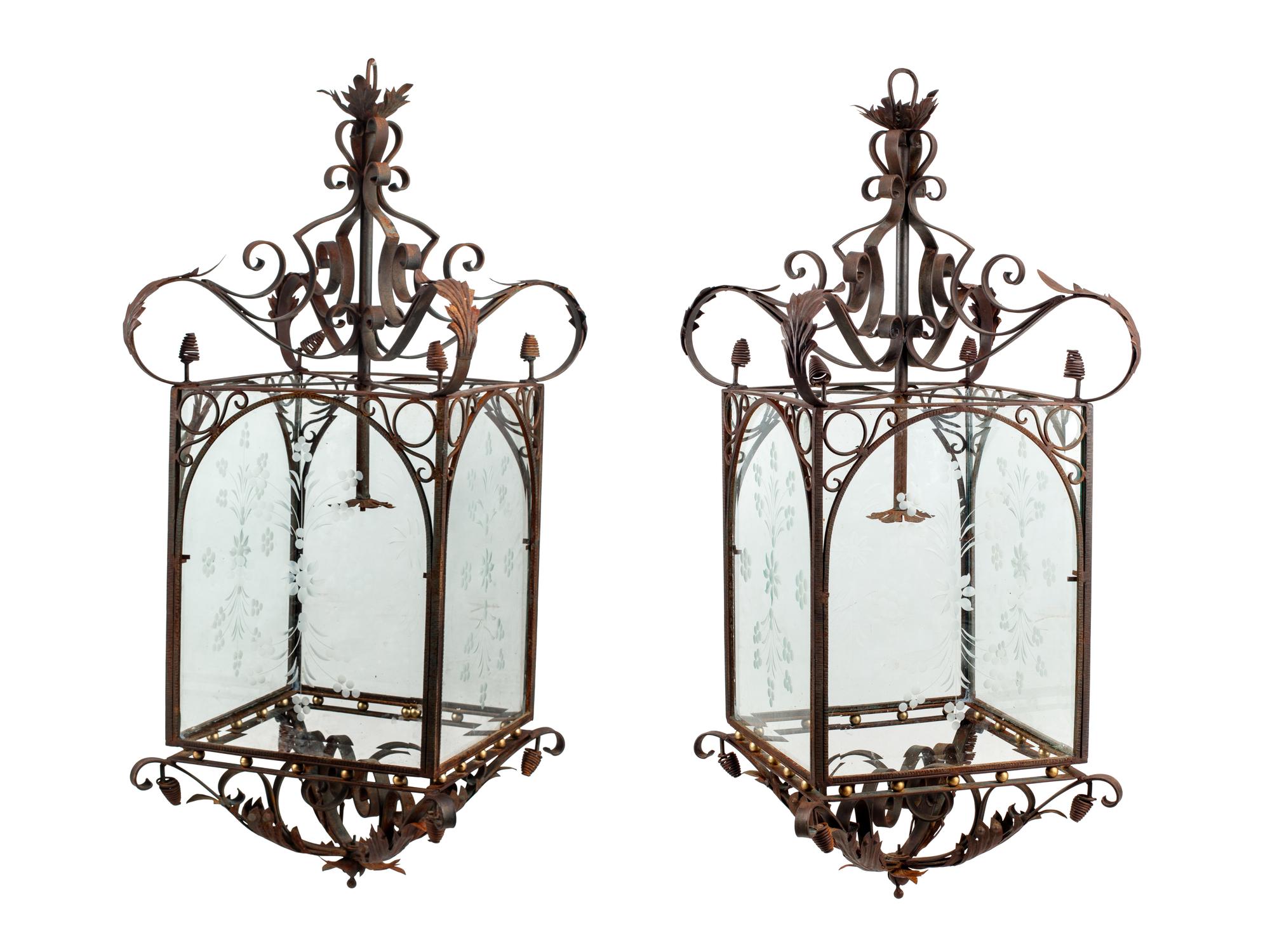 A Pair of Large Continental Wrought Iron and Etched Glass Lanterns