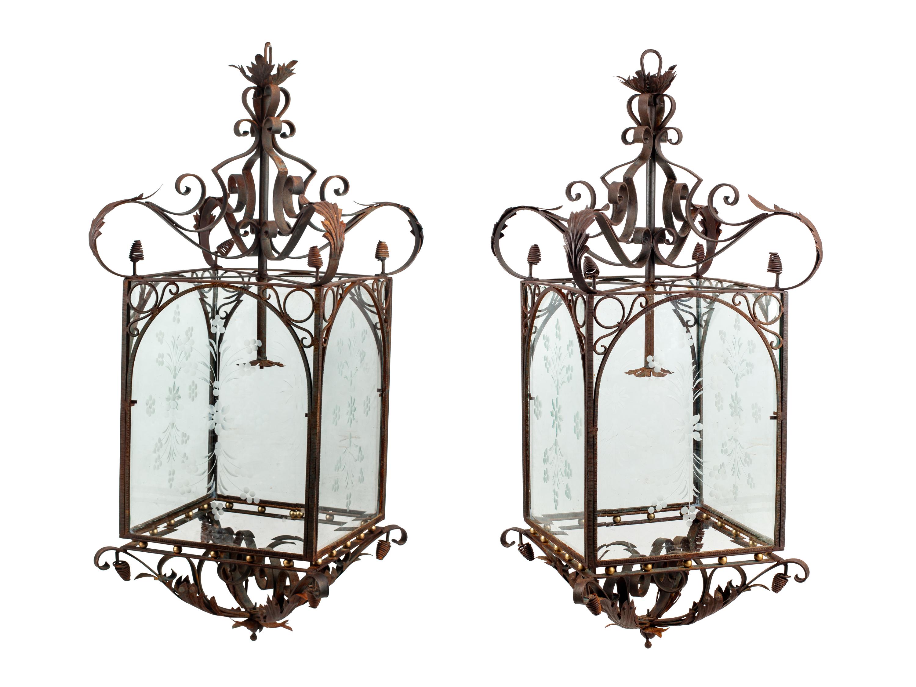 A Pair of Large Continental Wrought Iron and Etched Glass Lanterns