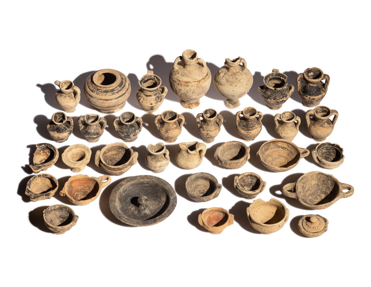 A Collection of Miniature Greek Painted Pottery Vessels