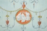 A Pair of Neoclassical Style Painted Wood Panels