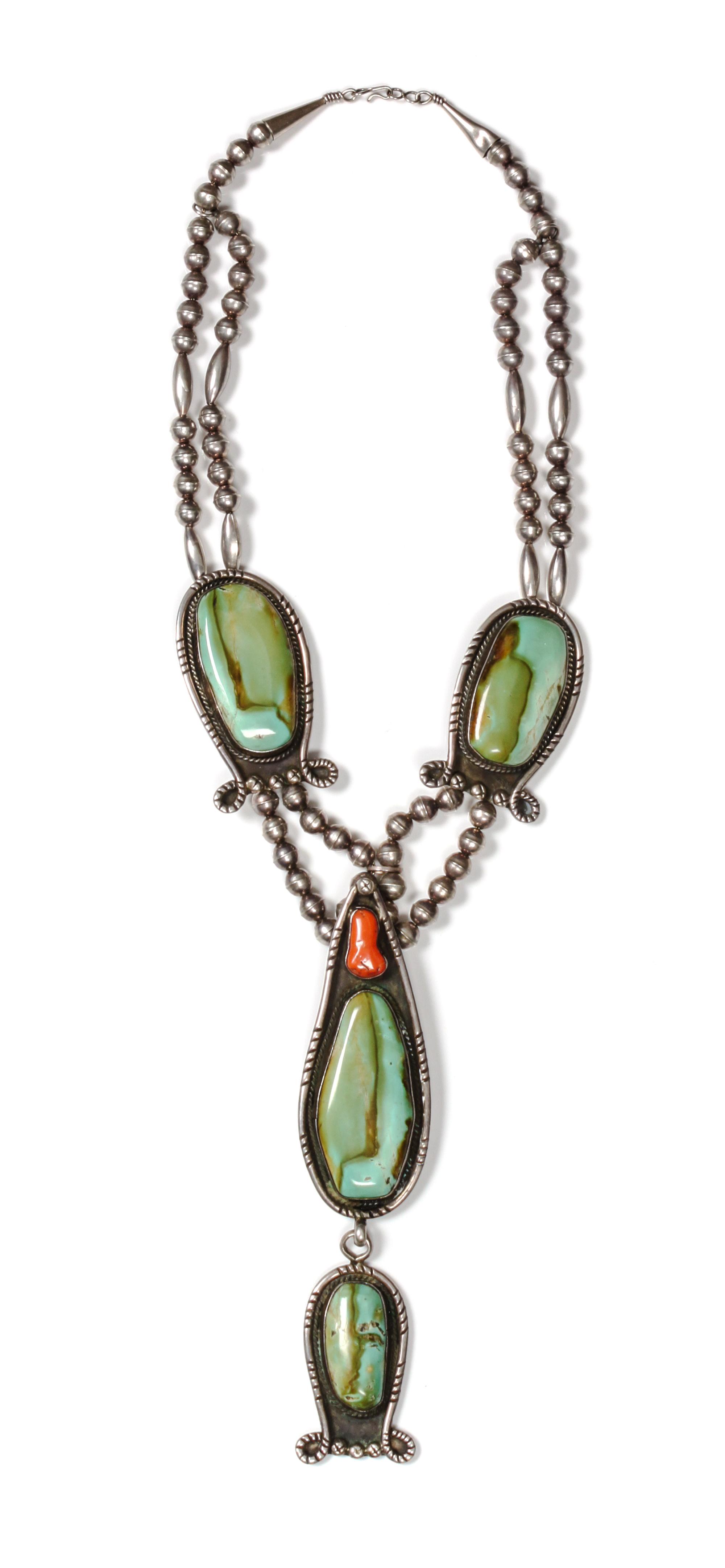 A Navajo Silver, Turquoise and Coral Necklace, Fred Thompson Length of necklace 22 inches, length of pendant 6 inches. — CIRCA 1945