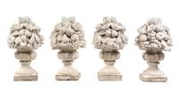 A Set of Four Cast Stone Models of Fruit-Filled Urns Height 25 inches. — 20TH CENTURY