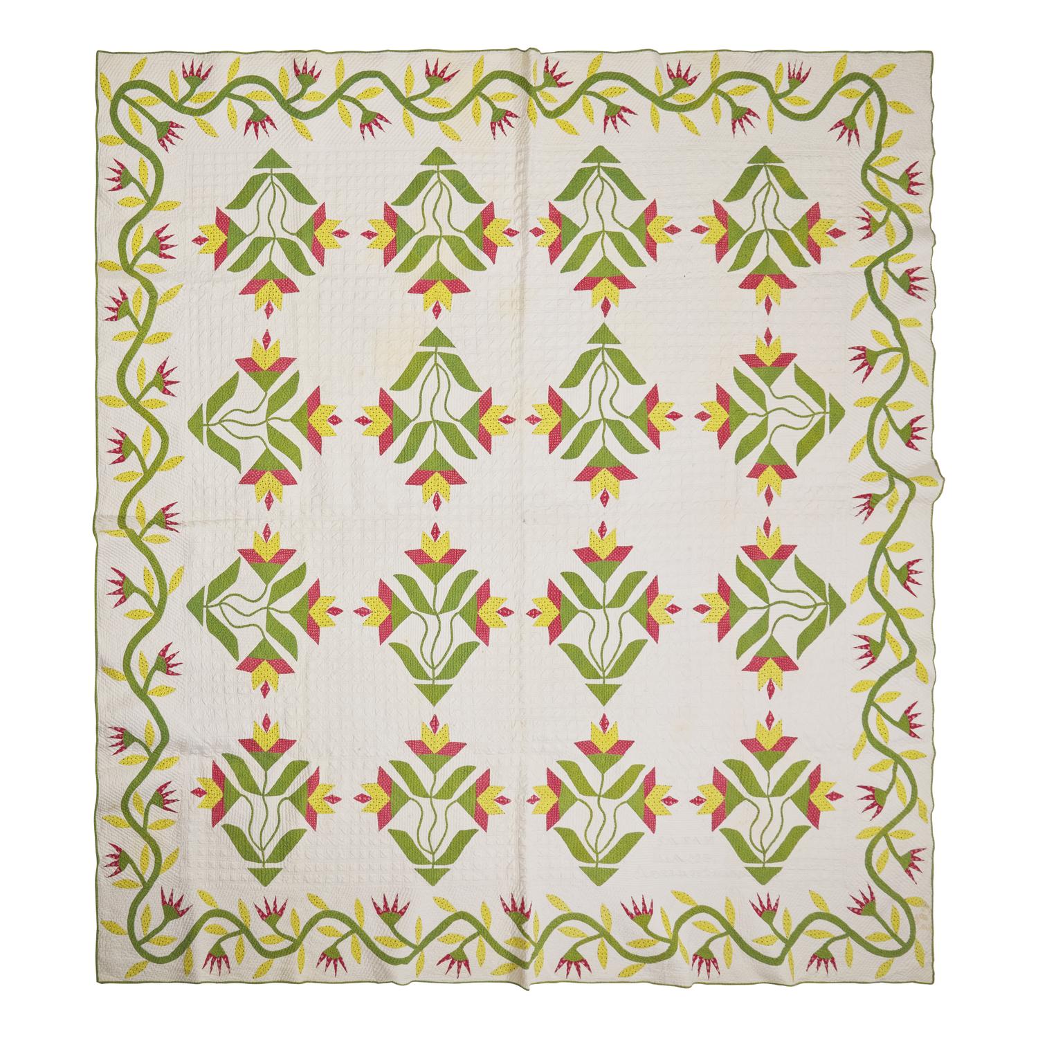 A Fine Pieced and Applique Printed Cotton Quilt
