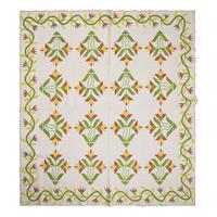 A Fine Pieced and Applique Printed Cotton Quilt