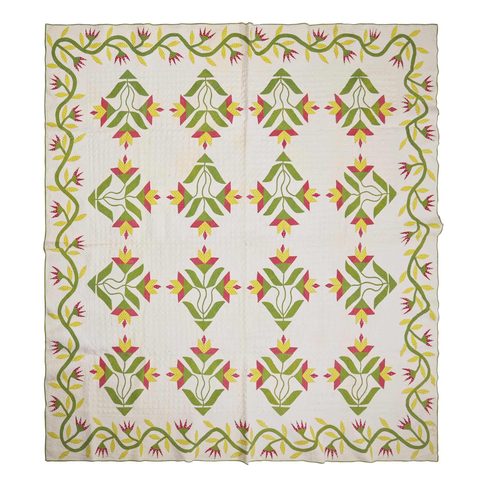 A Fine Pieced and Applique Printed Cotton Quilt