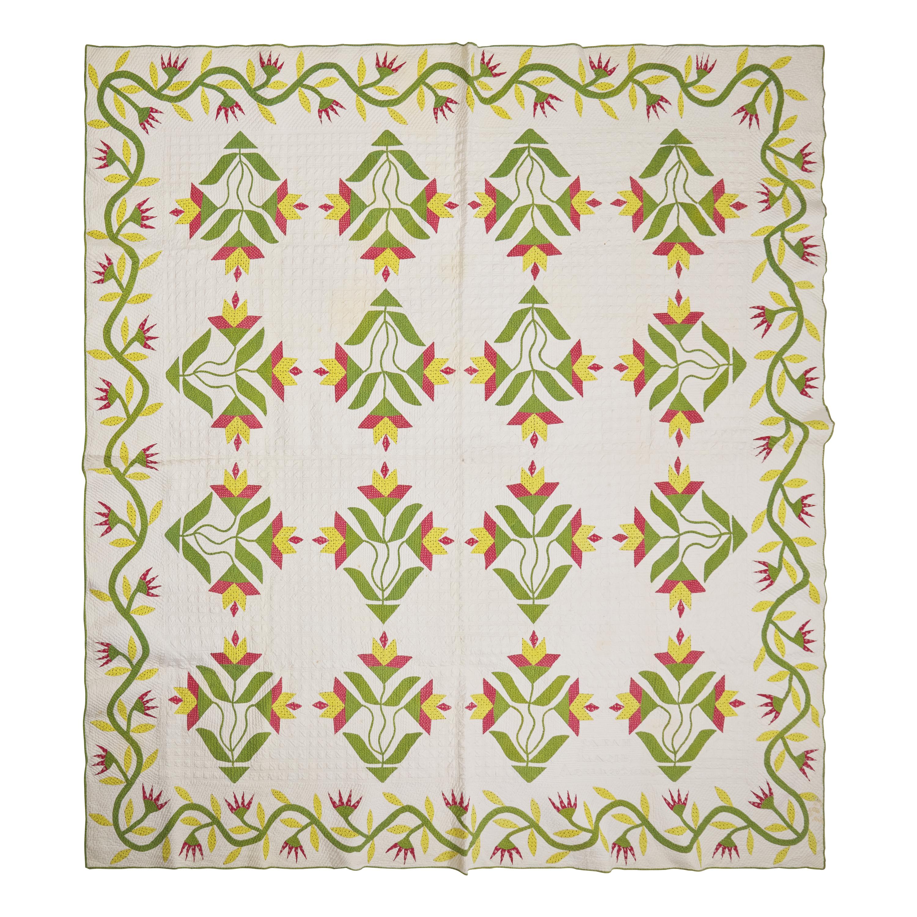 A Fine Pieced and Applique Printed Cotton Quilt