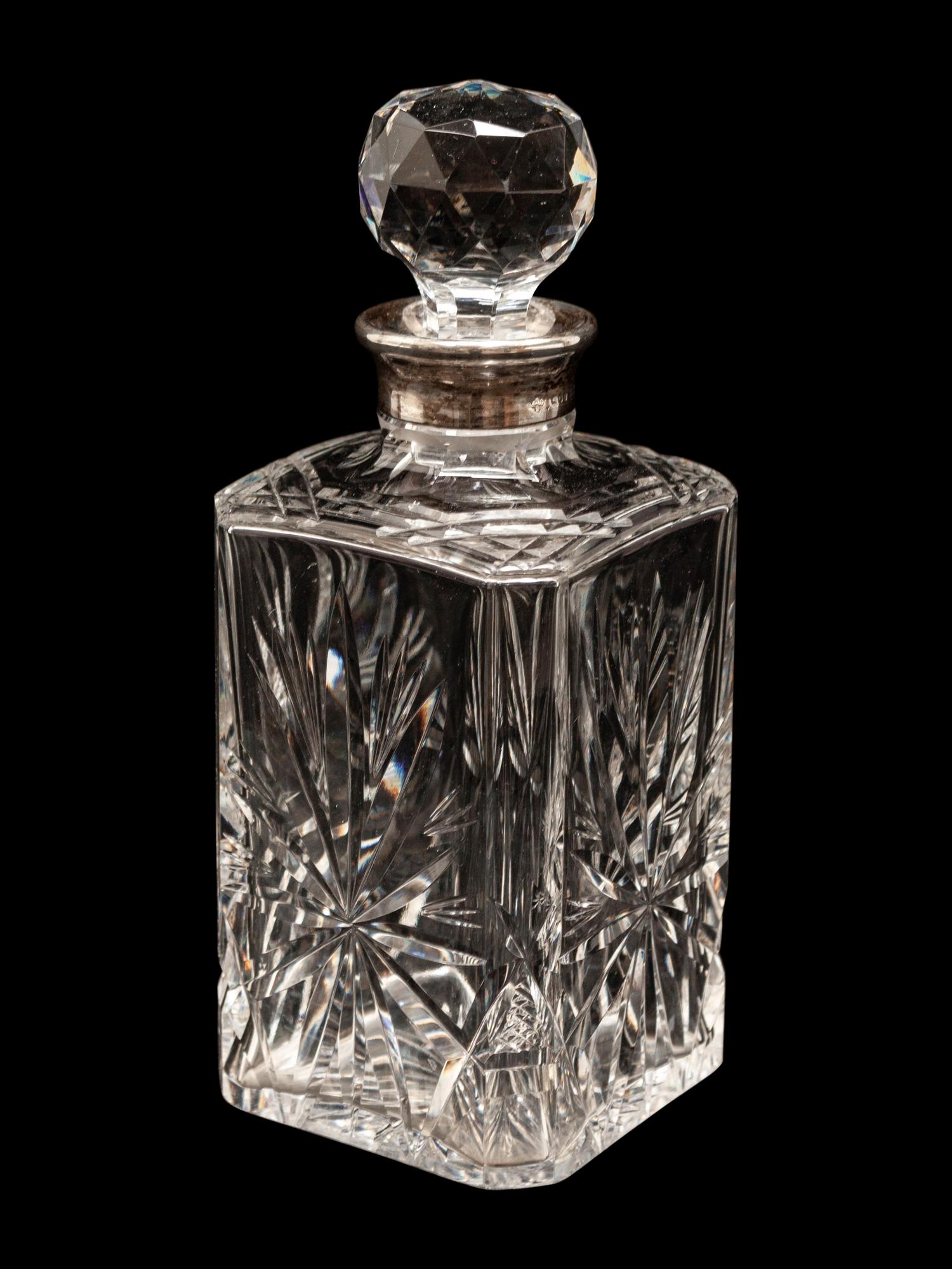 An Asprey & Co. Silver-Mounted Cut Glass Decanter