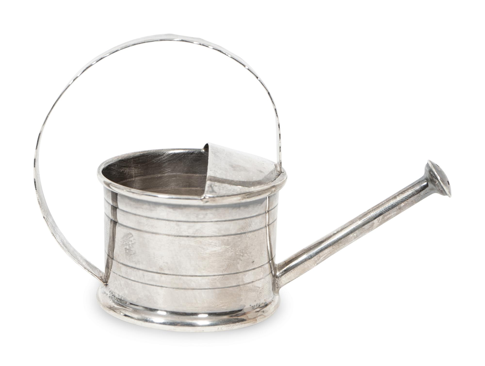 An American Fisher Sterling Silver Water Pitcher and A Cartier Sterling Silver Novelty Model of a Watering Can