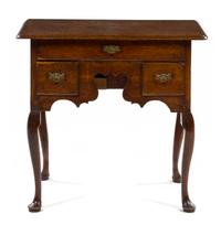 A George III Oak Lowboy, Height 27 1/2 x width 29 1/2 x depth 17 3/4 inches.