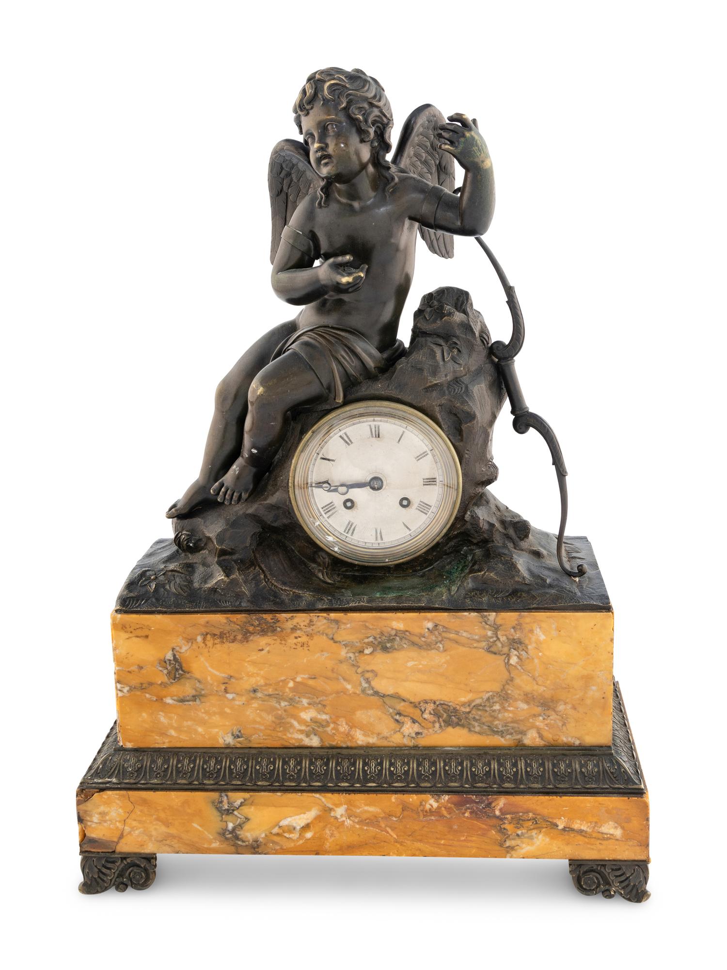 A Louis Philippe Bronze and Marble Figural Clock