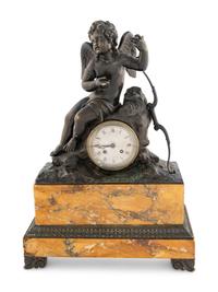 A Louis Philippe Bronze and Marble Figural Clock
