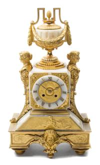 A Louis XVI Style Gilt Bronze and Onyx Mantel Clock Height 20 1/2 inches. — 19TH CENTURY