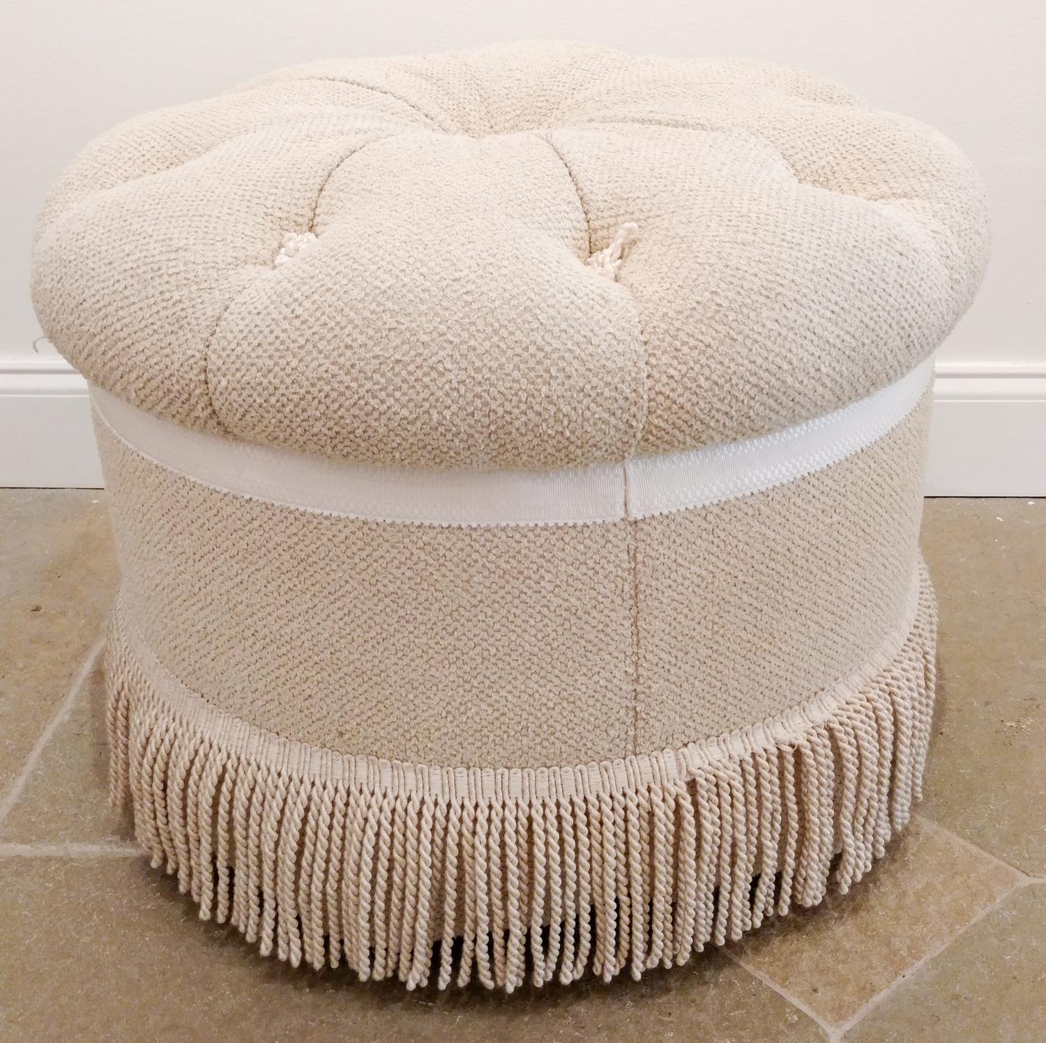 A Circular Button Tufted Ottoman Height 18 inches.