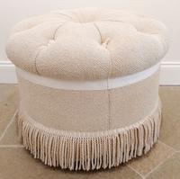 A Circular Button Tufted Ottoman Height 18 inches.