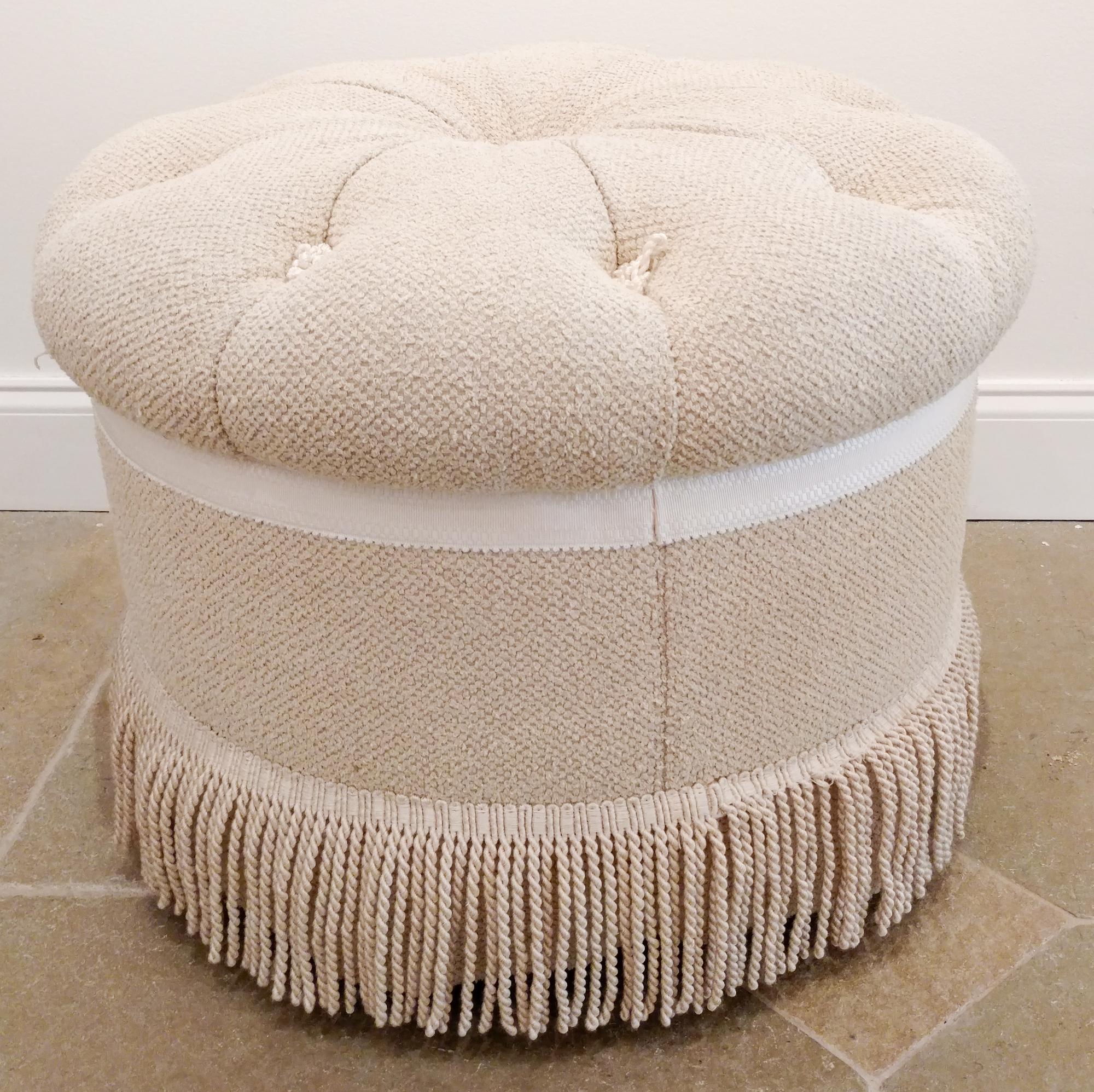 A Circular Button Tufted Ottoman Height 18 inches.