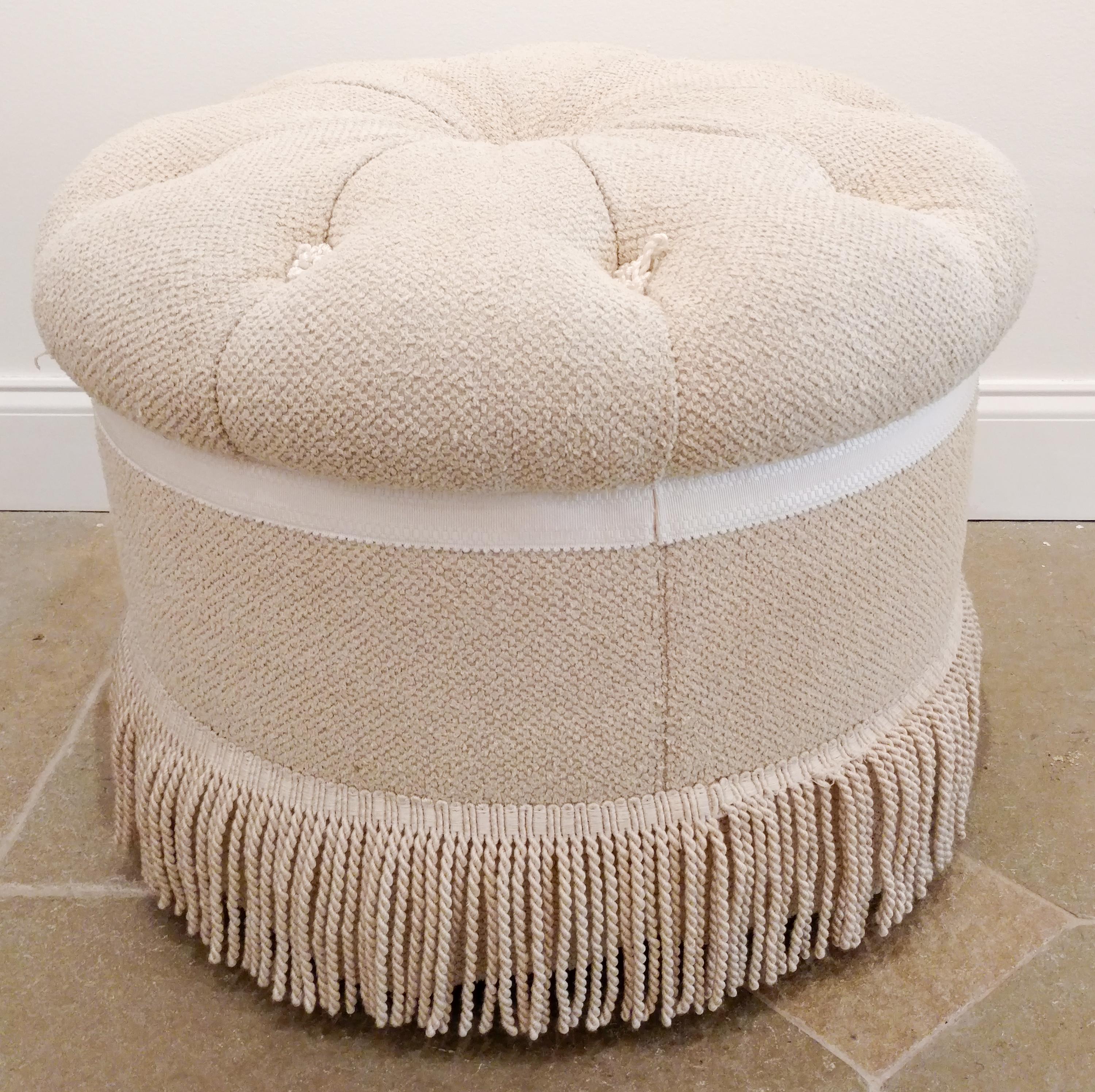 A Circular Button Tufted Ottoman Height 18 inches.