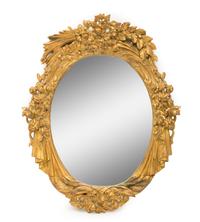 A Large Continental Giltwood Oval Mirror