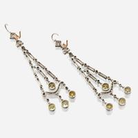 A pair of diamond, colored diamond, and platinum pendant earrings