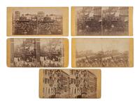 [LINCOLN FUNERAL]. A group of 5 stereoviews documenting the procession and buildings draped in mourning, Philadelphia.