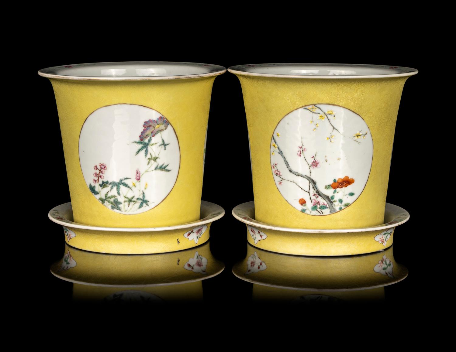 A Pair of Chinese Yellow Ground Famille Rose Cache Pots and Undertrays