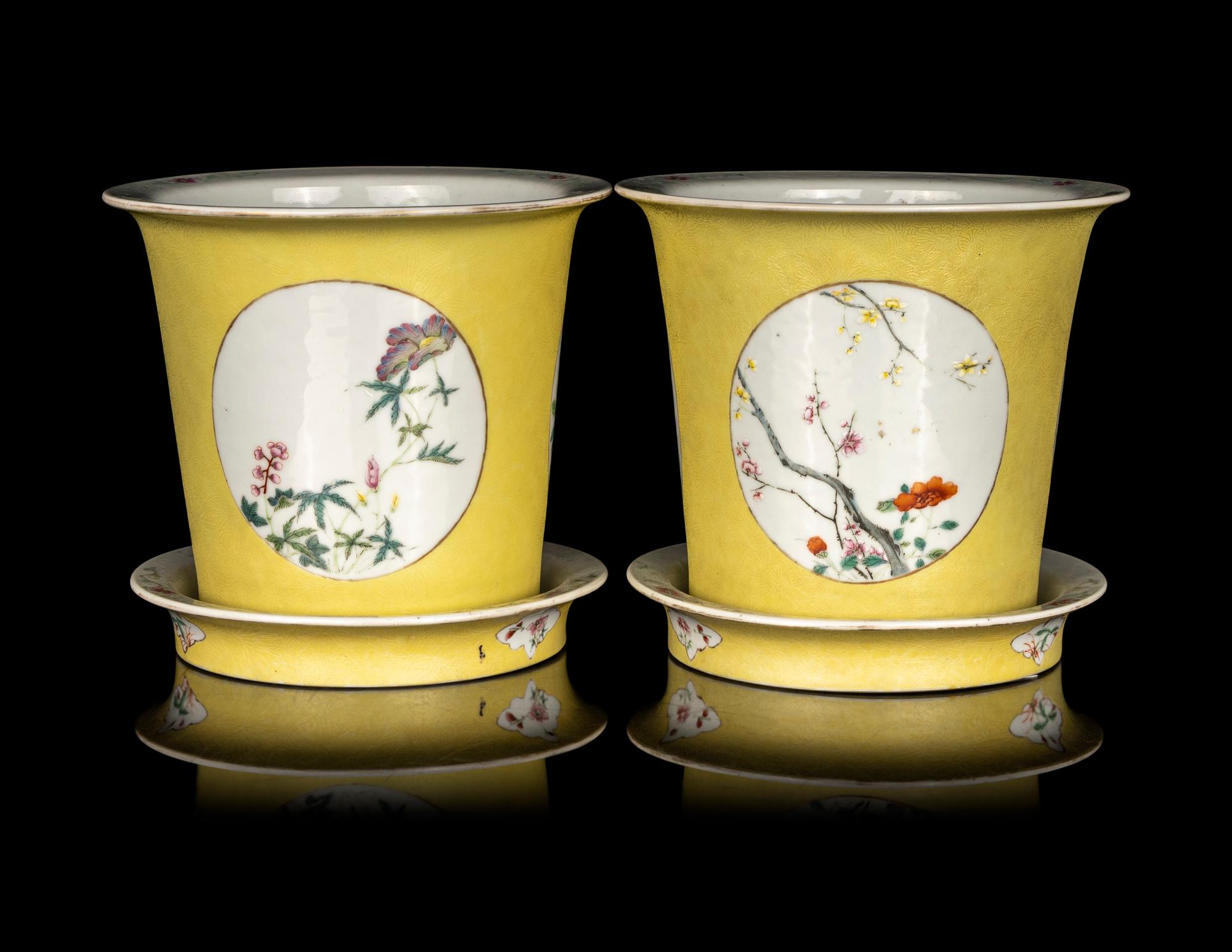 A Pair of Chinese Yellow Ground Famille Rose Cache Pots and Undertrays