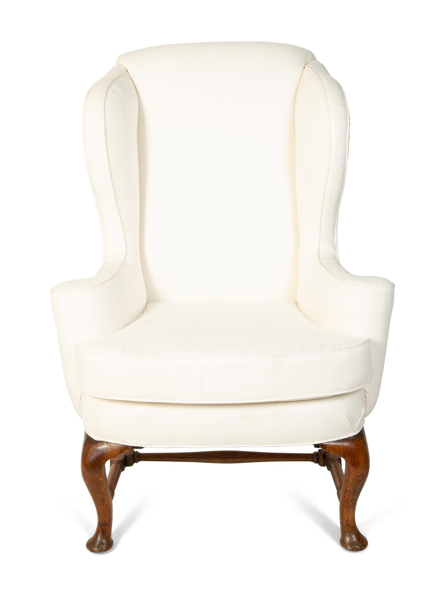 A Queen Anne Style Wingback Armchair — 18TH CENTURY