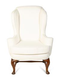 A Queen Anne Style Wingback Armchair — 18TH CENTURY