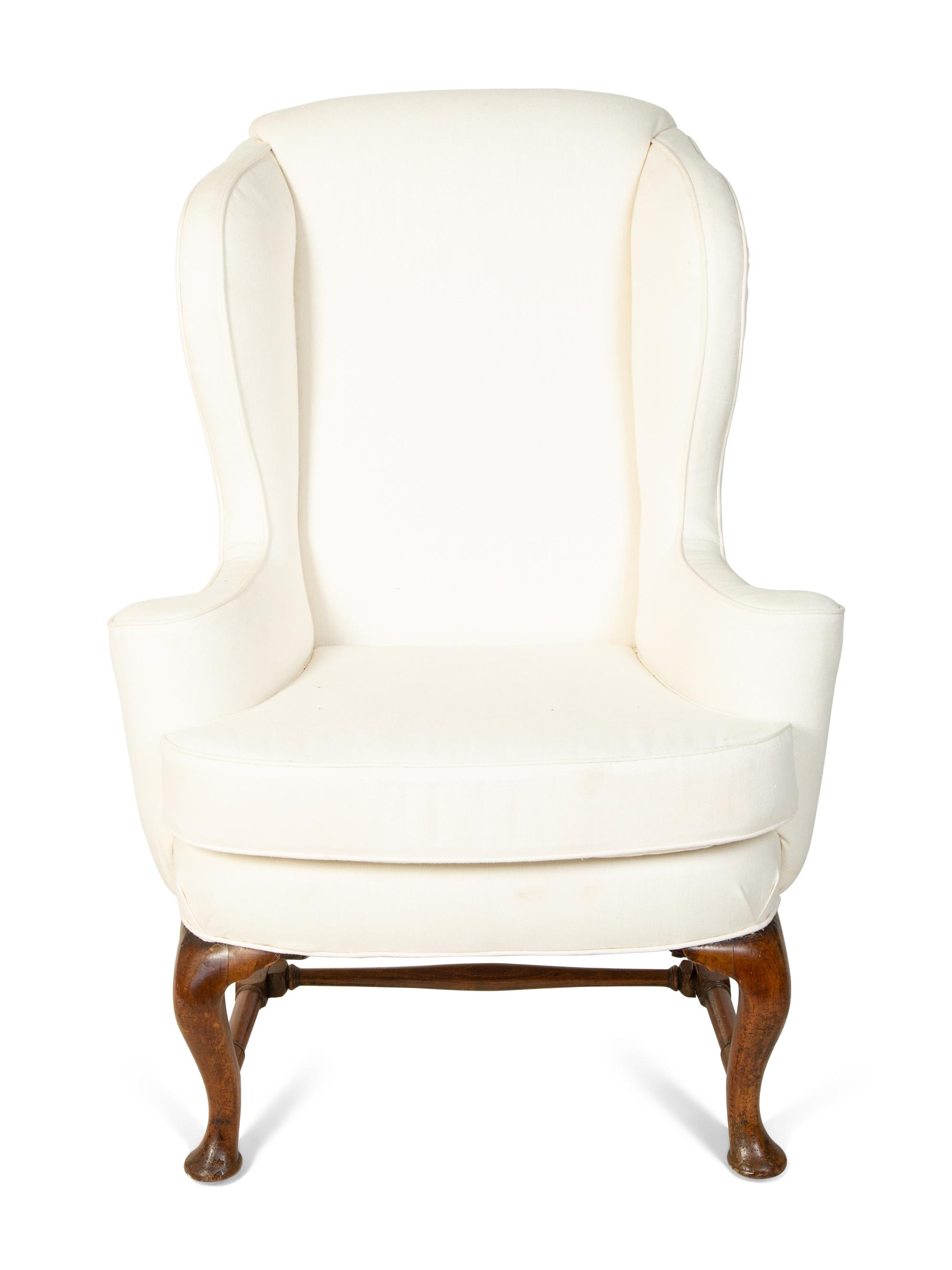 A Queen Anne Style Wingback Armchair — 18TH CENTURY