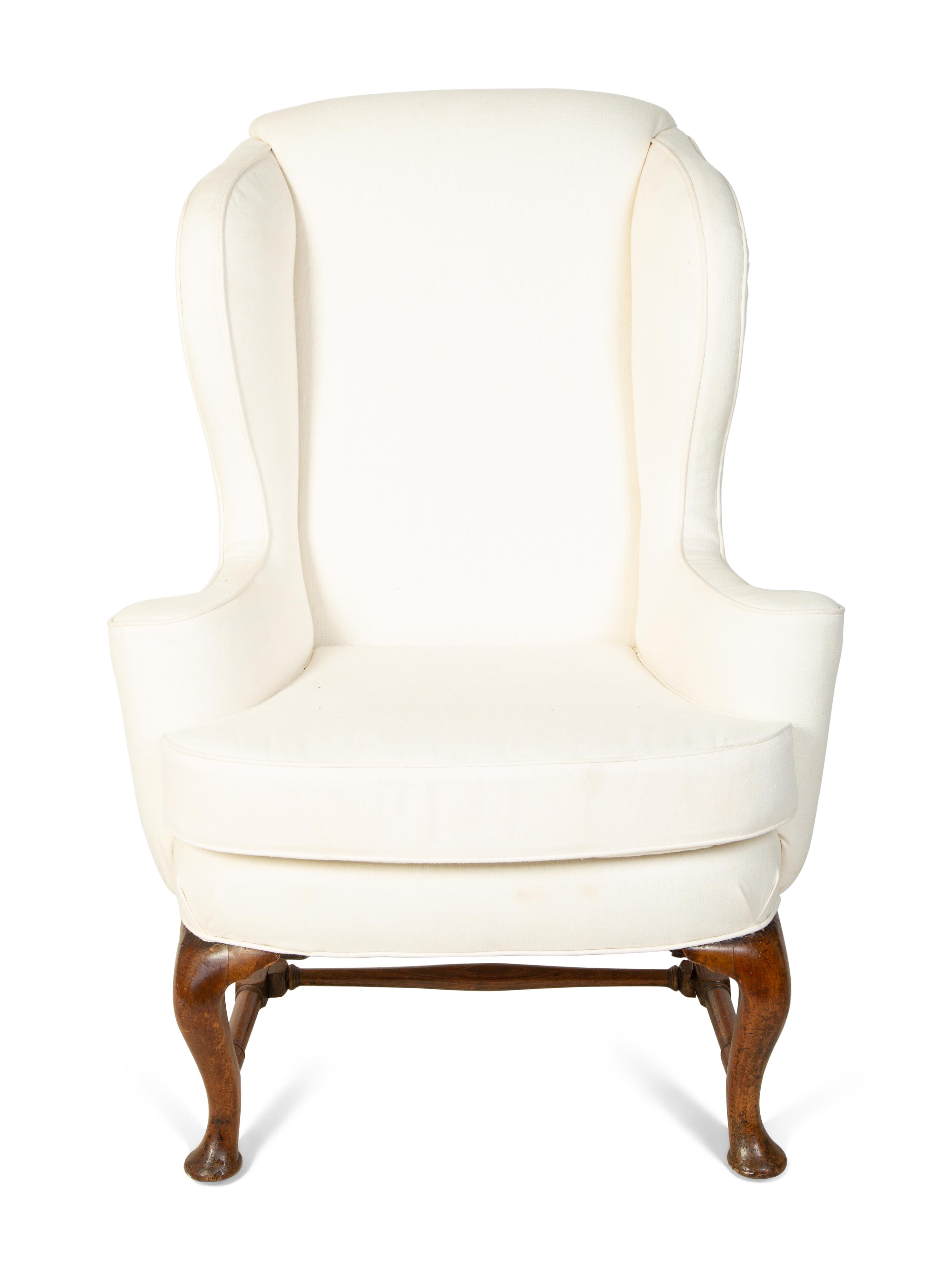 A Queen Anne Style Wingback Armchair — 18TH CENTURY