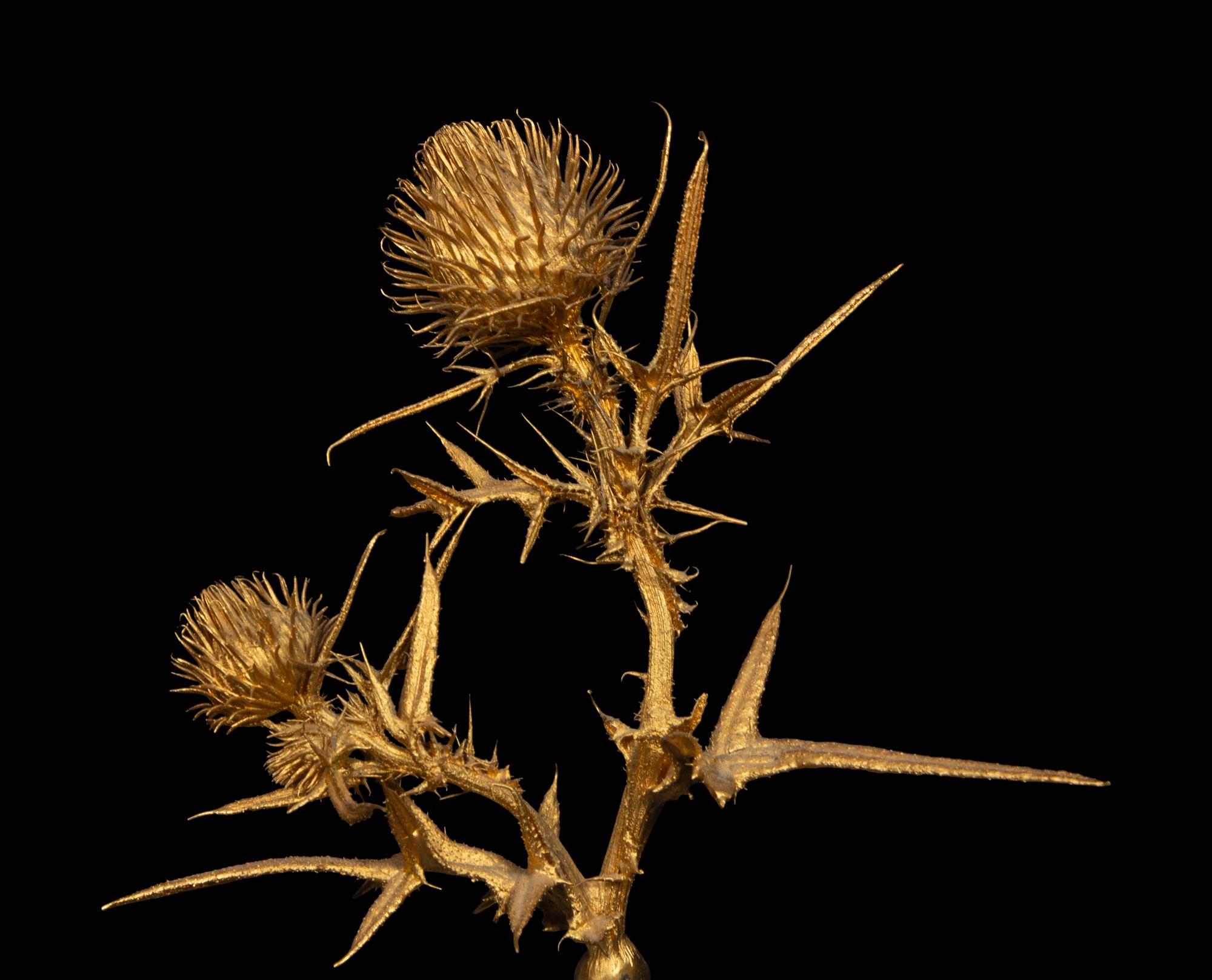 A Steuben Glass and Gold Vermeil Thistle Rock Sculpture