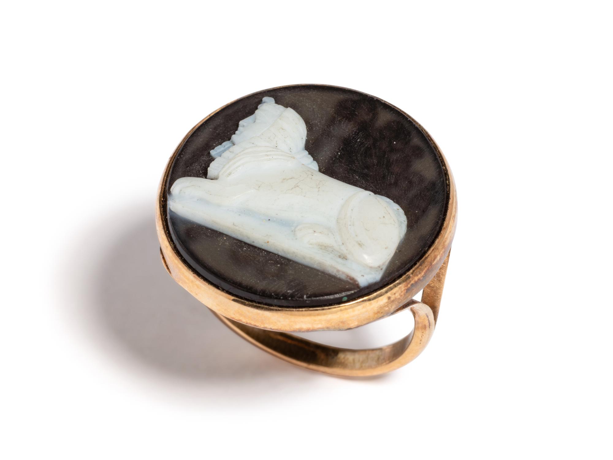 A Neoclassical Gold and Onyx Cameo Ring with a Sphinx