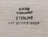 An American Arts and Crafts Silver Platter, Art Silver Shop, Chicago, having a spot-hammered finish, with an applied EMH monogram.
