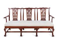 A George III Style Carved Mahogany Triple-Back Settee