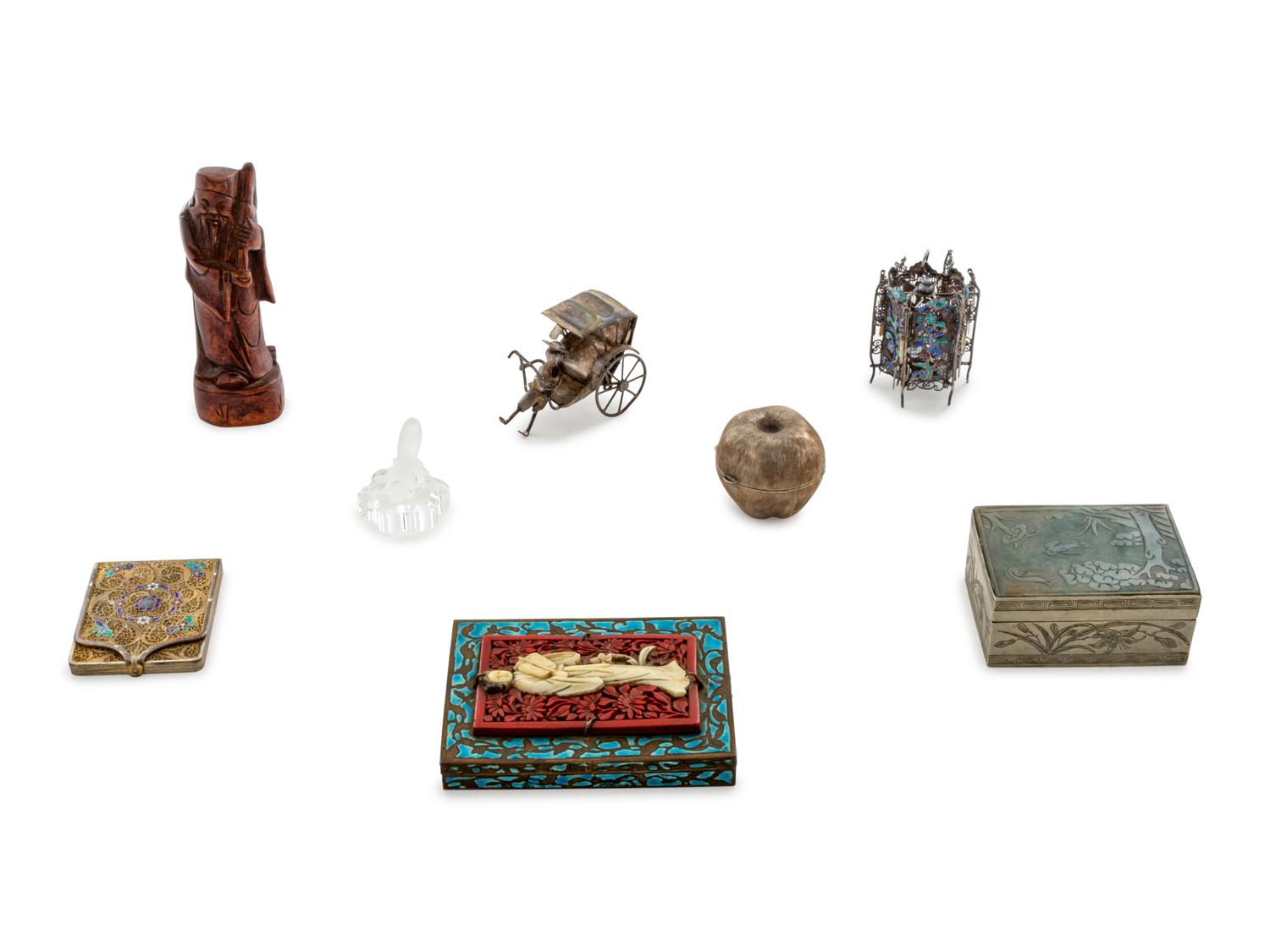 A Collection of Eight Decorative Cabinet Articles