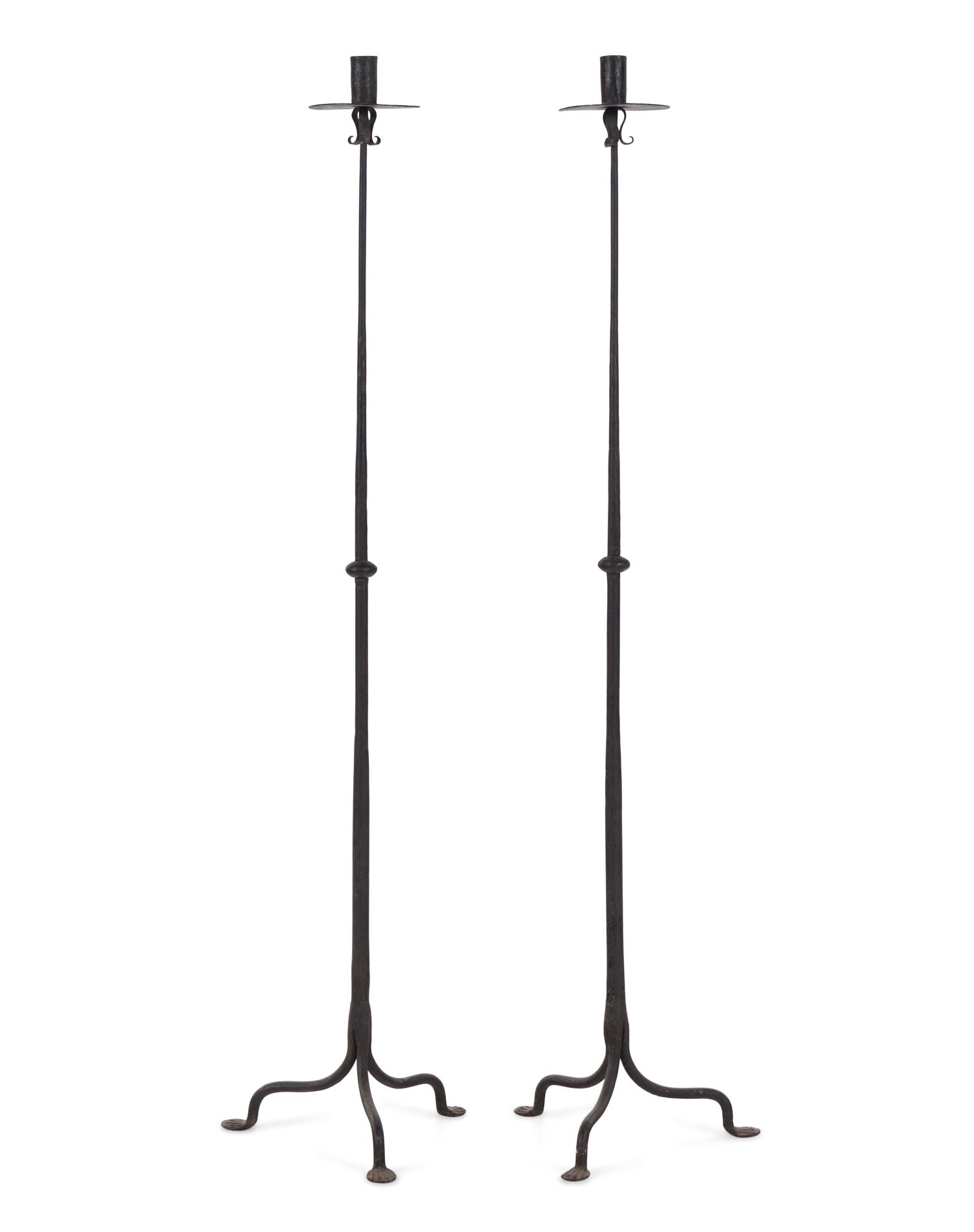 A Pair of Spanish Wrought Iron Floor Candlesticks