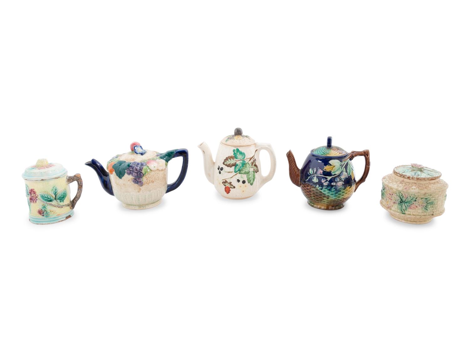 A Group of Eleven Majolica Pitchers, Teapots and Lidded Vessels