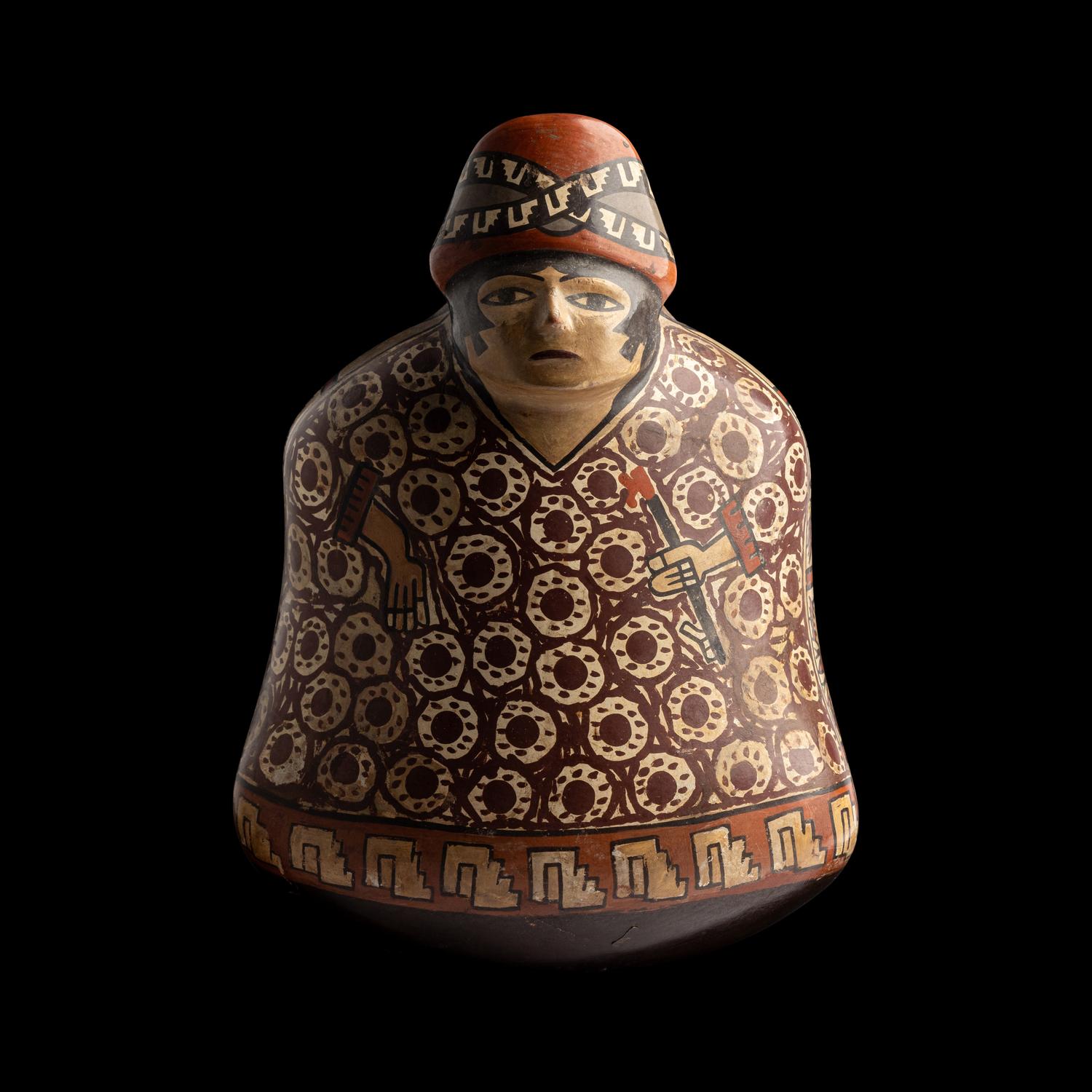 A Nazca-Huari Seated Figure Vessel