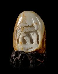 A Chinese Russet and White Jade Boulder