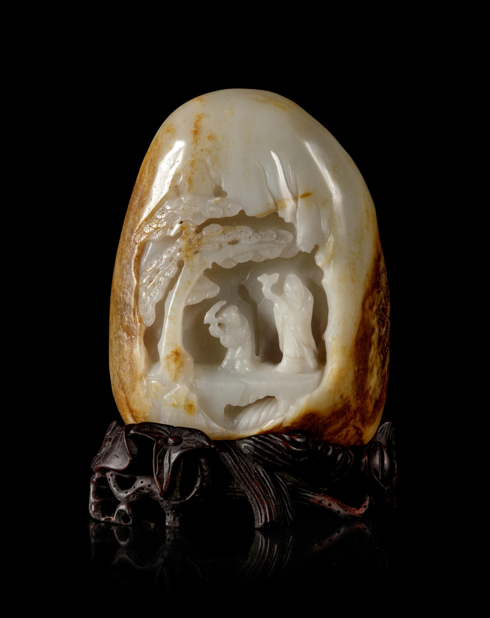 A Chinese Russet and White Jade Boulder