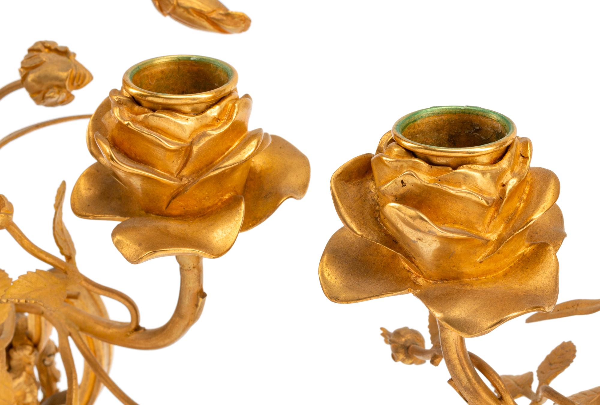 A Pair of French Gilt Bronze and Marble Three-Light Candelabra