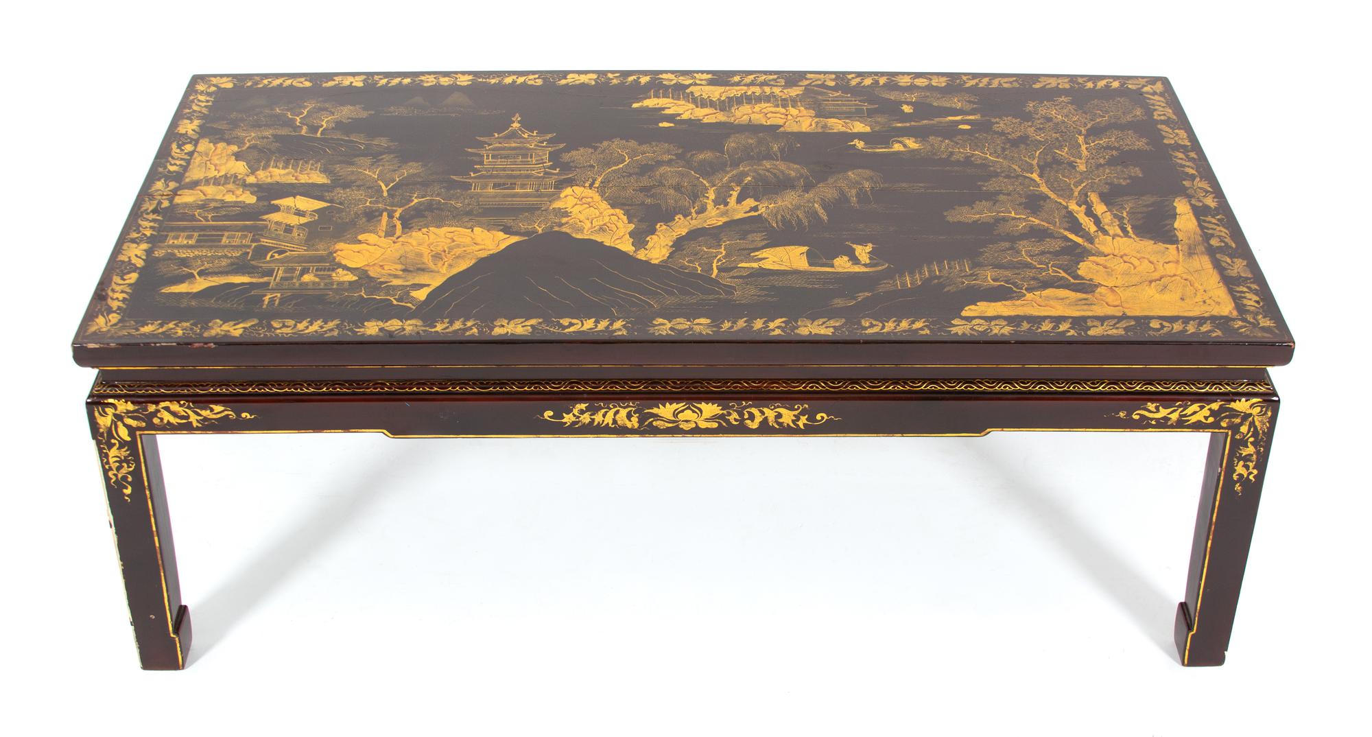 A Chinoiserie Decorated Black and Gilt Lacquered Low Table Height 15 1/2 x width 44 1/2 x depth 22 1/2 inches. — 19TH/20TH CENTURY