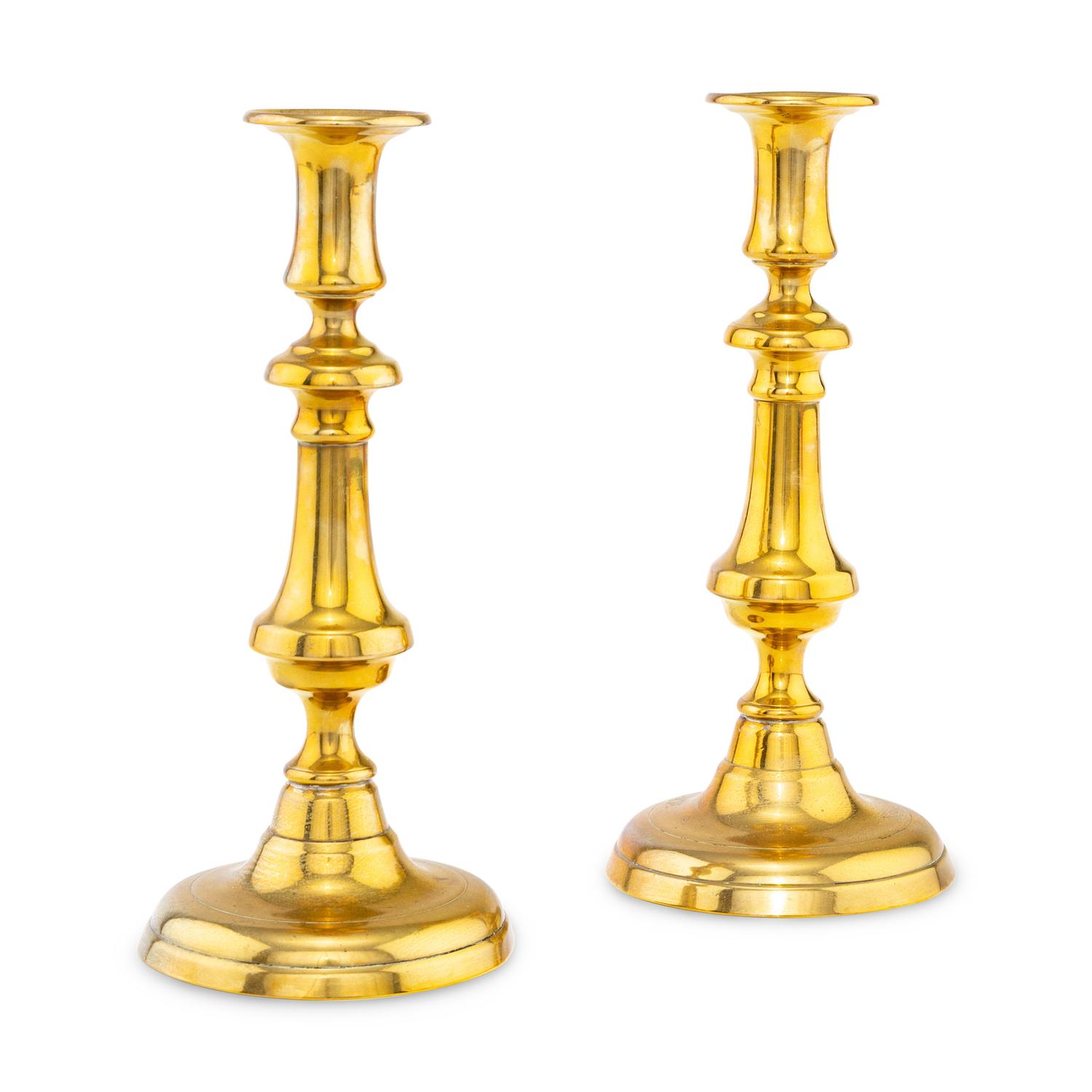 A Pair of English Brass Candlesticks